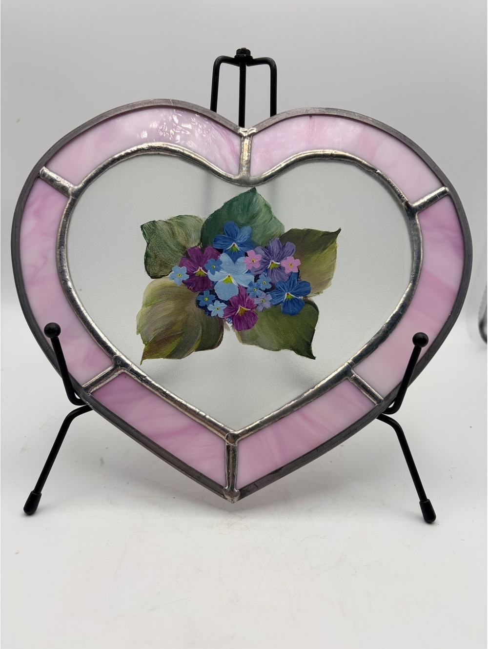 Stained glass heart. With a hand painted floral design.